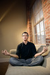 Man in lotus pose