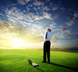 happy young businessman and sunset