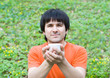Handsome man drinking coffee in nature