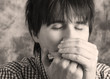 Man playing harmonica