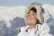 Young woman enjoying winter sun