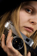 Retro woman photographer. Vintage camera Retro woman photographer. Vintage camera