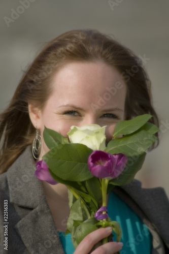 Photo: smiling girl with boquet smiling girl with boquet