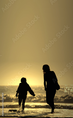 Photo: mother and son with bodyboard board mother and son with bodyboard board