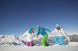 Couple and daughter walking in snow