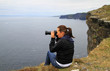 Photographer in irish scenery Photographer in irish scenery