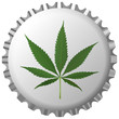 cannabis leaf on bottle cap against white