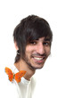 portrait of a happy smiling young good looking  man with piercin