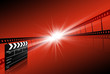 clap board ant film strip on red background clap board ant film strip on red background