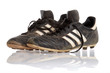 Pair black leather soccer shoes isolated on white