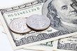coins on dollars background