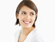 Pretty female looking at copyspace with a smile