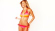 Young girl wearing bikini dancing