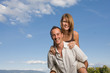 Photo: Young lovers piggy back Young lovers piggy back