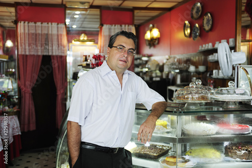 Photo: small business: owner of a cafe small business: owner of a cafe
