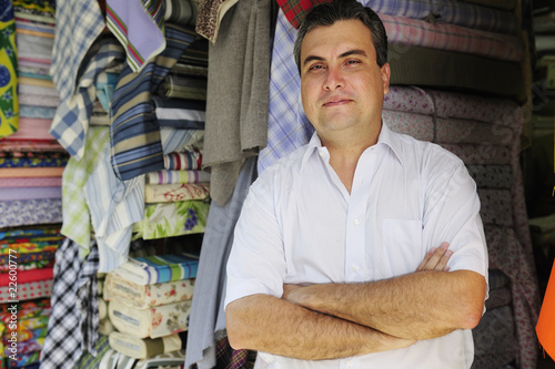 Photo: portait of a retail store owner portait of a retail store owner