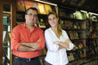 Photo: family business partners owners of a small bookstore family business partners owners of a small bookstore