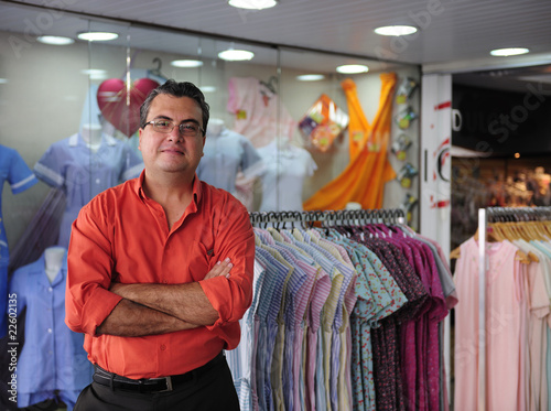 Photo: portait of a retail store owner portait of a retail store owner