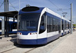 Modern tram parked at the metro station Modern tram parked at the metro station