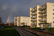 Rainbow with sun on the apartment blocks