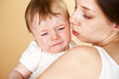 baby boy crying in mothers arm baby boy crying in mothers arm