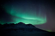 Northern Lights above a mountain