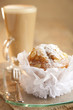 stylish almond muffin and coffee on background stylish almond muffin and coffee on background