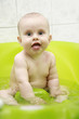 New baby washing and smiling