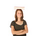 Teen girl balancing text book on her head