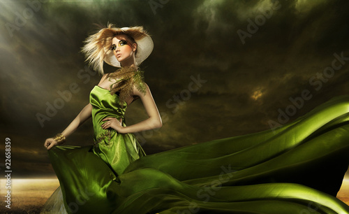 Photo: Stunning beauty over cloudy background Stunning beauty over cloudy background