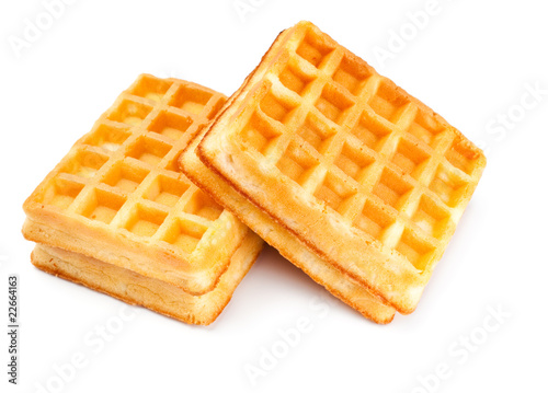 Photo: soft waffles isolated on white background soft waffles isolated on white background