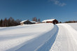 Small wooden houses in winter. Small wooden houses in winter.