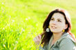 Young girl relaxing on a meadow