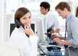 Photo: Smiling businesswoman talking to the phone Smiling businesswoman talking to the phone