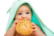 Baby eating  bun