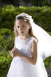 Photo: Beautiful child in white dress holding rosary Beautiful child in white dress holding rosary