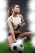 Sexy football player on stadium