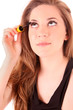 Beautiful young woman face with applying natural beauty make-up.