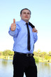 Closeup of businessman showing ok