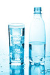 glass of water and bottle
