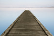 Zen jetty on foggy lake