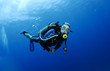 scuba diver in clear blue water