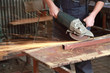 Grinding, hands of worker with tool