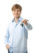 Young man holding ignition keys