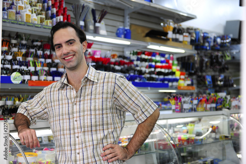 Photo: proud owner of stationery shop proud owner of stationery shop