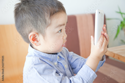 Photo: Infant and iphone Infant and iphone