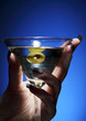 Martini glass with olive inside