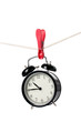 Foto: alarm clock on the clothesline alarm clock on the clothesline