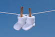 concept de grossesse: chaussons de bébé concept de grossesse: chaussons de bébé