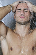 good looking man under man shower good looking man under man shower